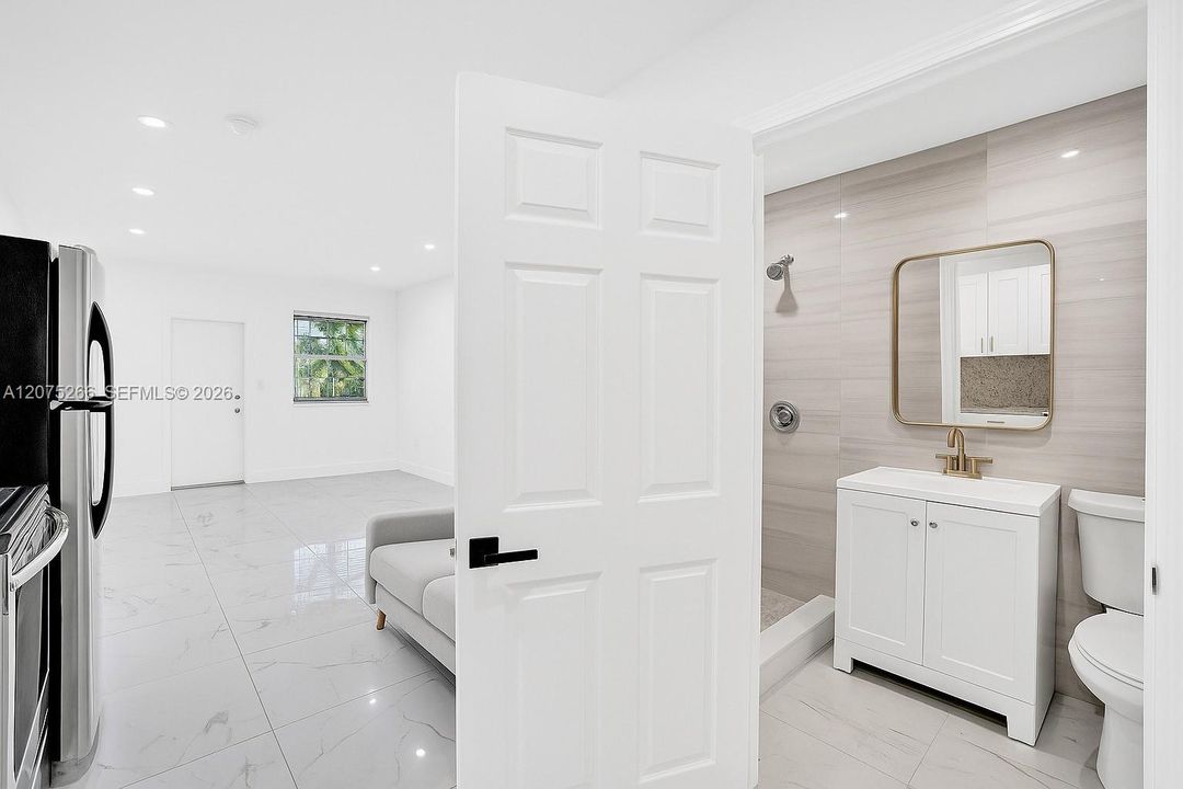 The unit is UNFURNISHED- This photo is VIRTUAL STAGED FOR VISUALIZATION