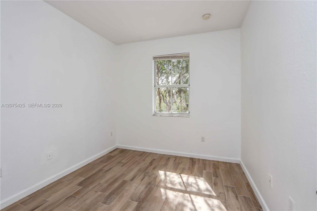Bright bedroom space with clean finishes.