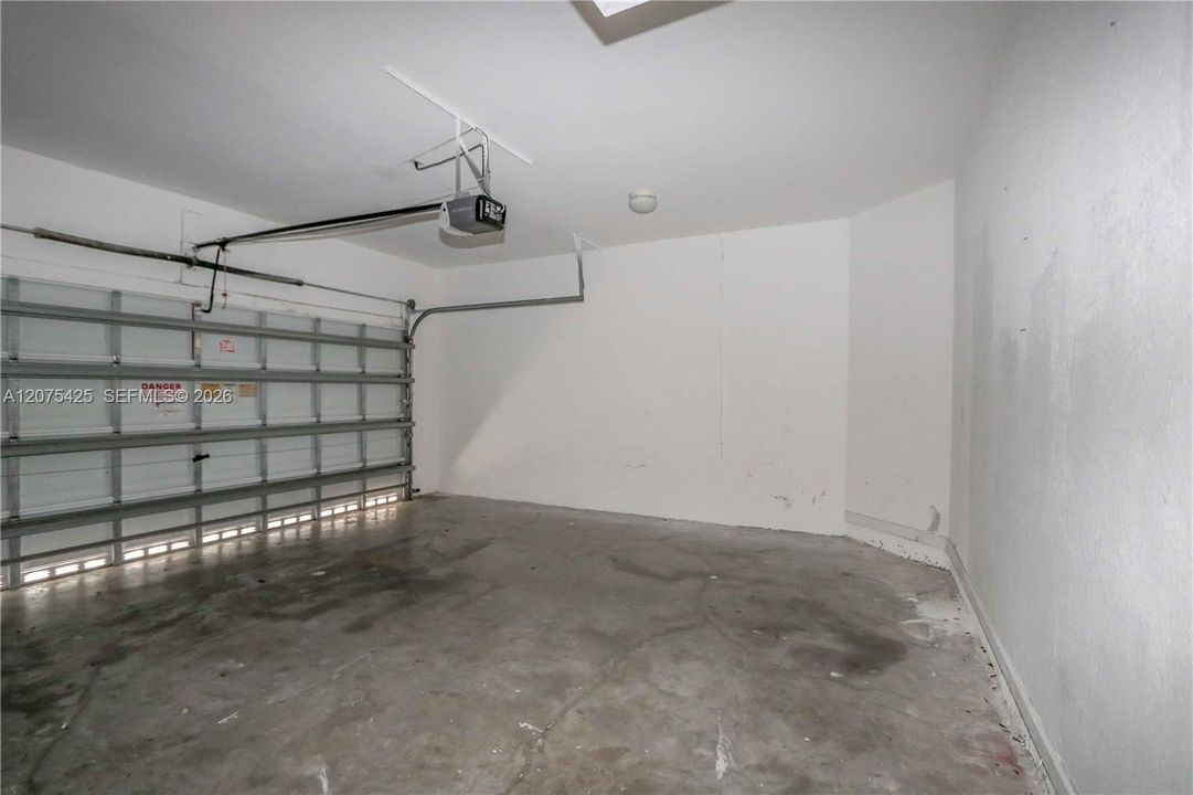 Clean and organized two-car garage interior.