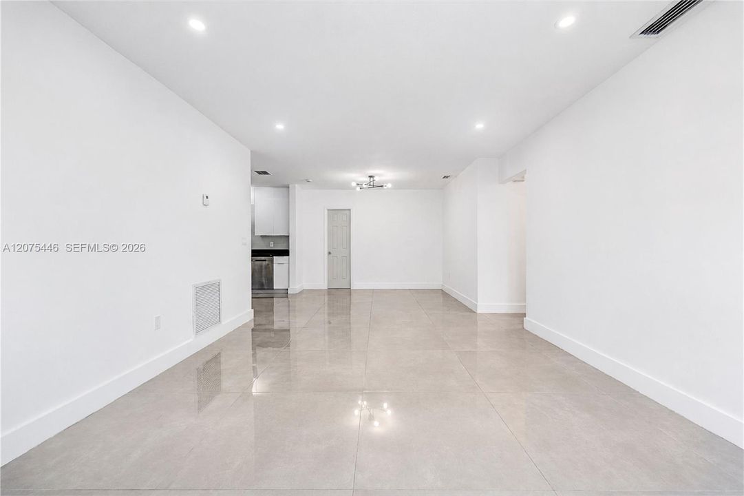 Bright open-concept living and dining area.