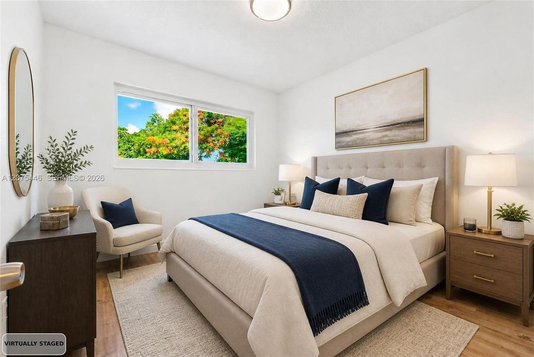 Virtually staged primary bedroom showcasing the room's layout and potential.