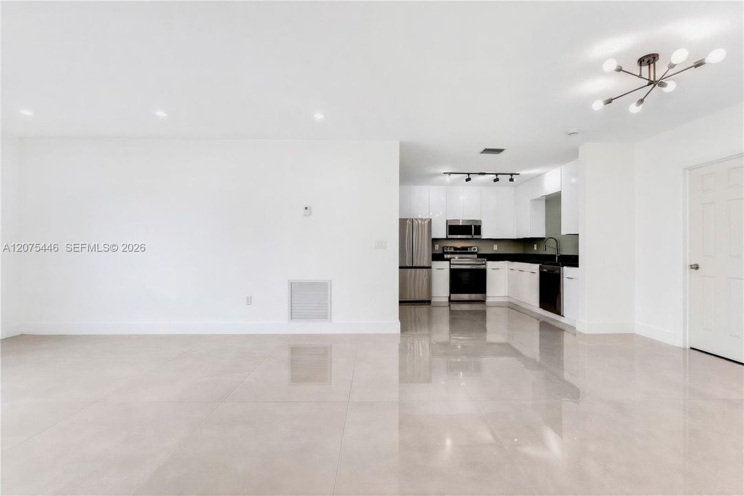 Bright open-concept living and dining area.