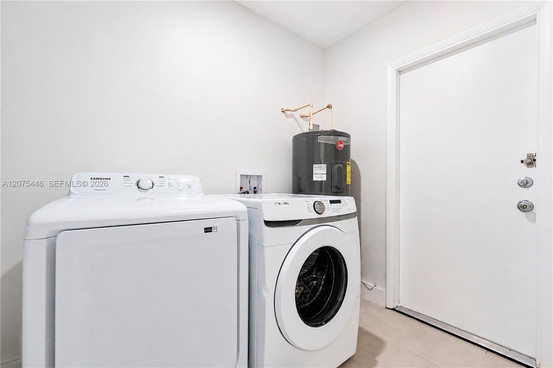 Laundry room with washer and dryer.