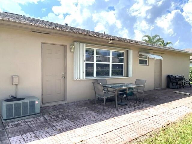 Newer windows accordion shutters and bac