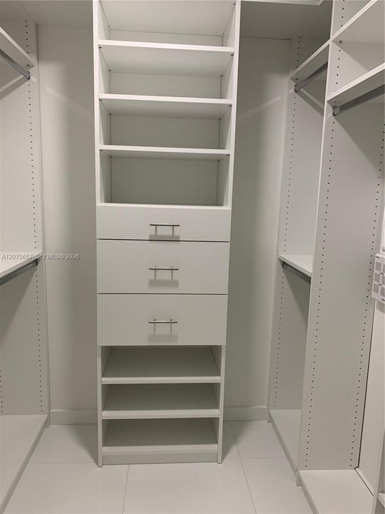 walk in closets in all bedrooms and den
