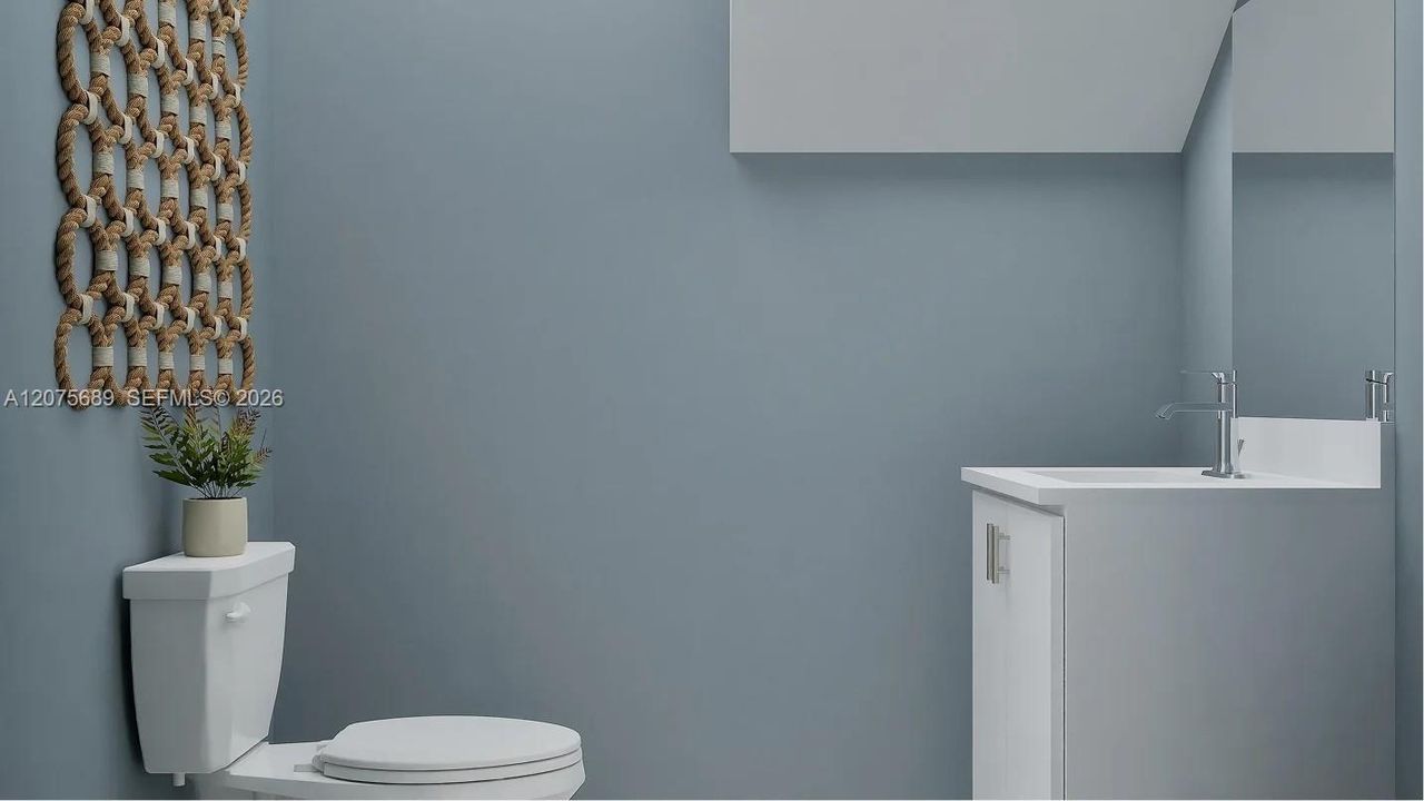 This home features a practical powder room on the first floor and it is readily accessible to residents and guests.