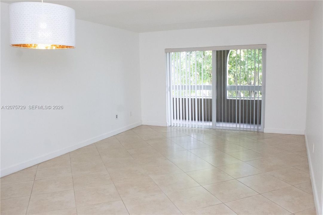 Spacious living room, large tiles. Balcony has the highly sough after arches for added privacy.