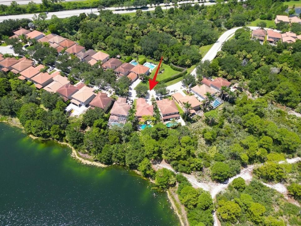 Back aerial red arrow with lake