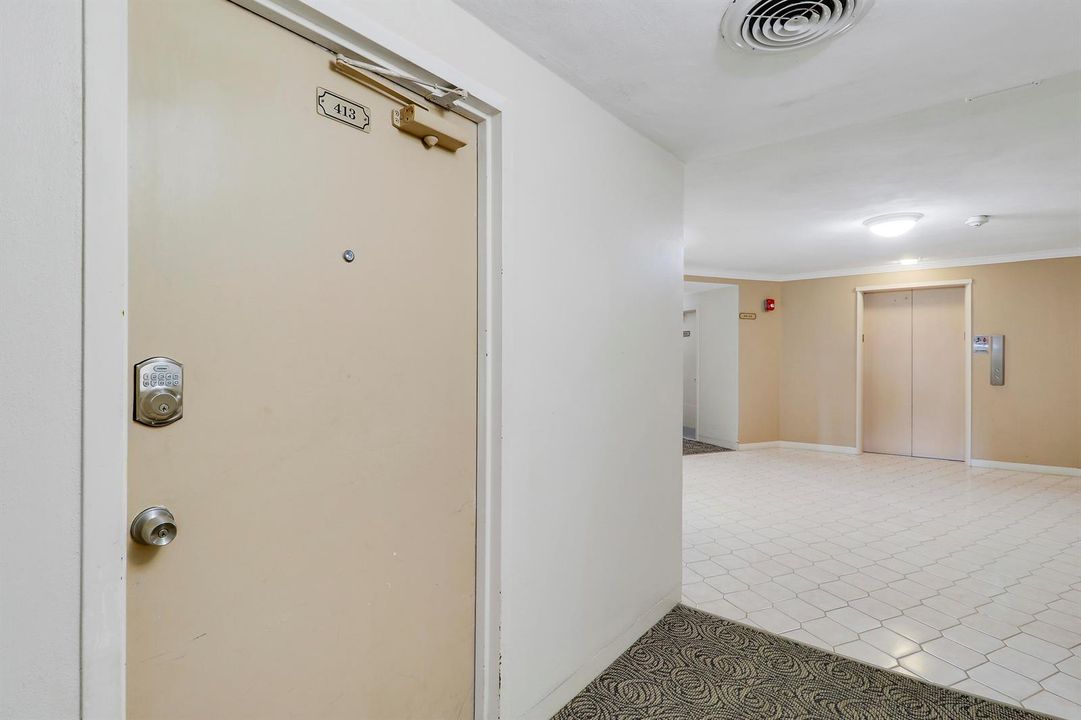Entry Door/Steps from Elevators
