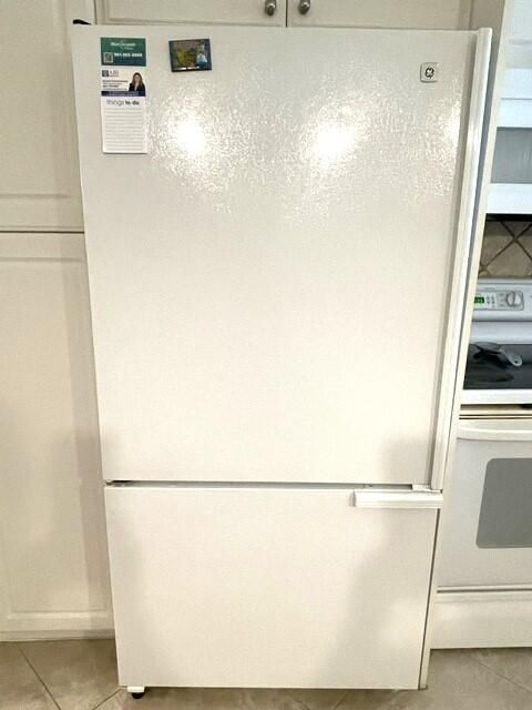 Bottom loading refrigerator