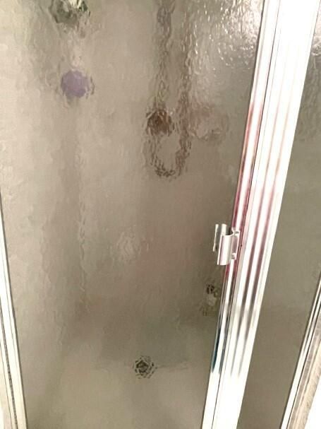 Full guest bathroom with shower stall