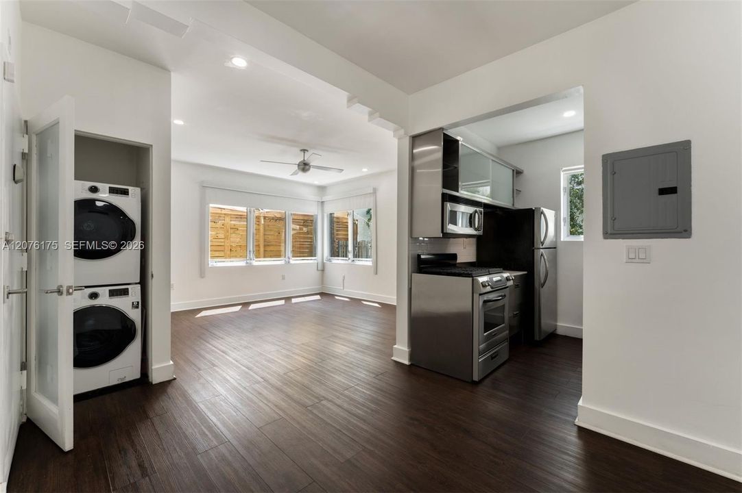 Kitchen, Living Room, and Stacked Washer/Dryer