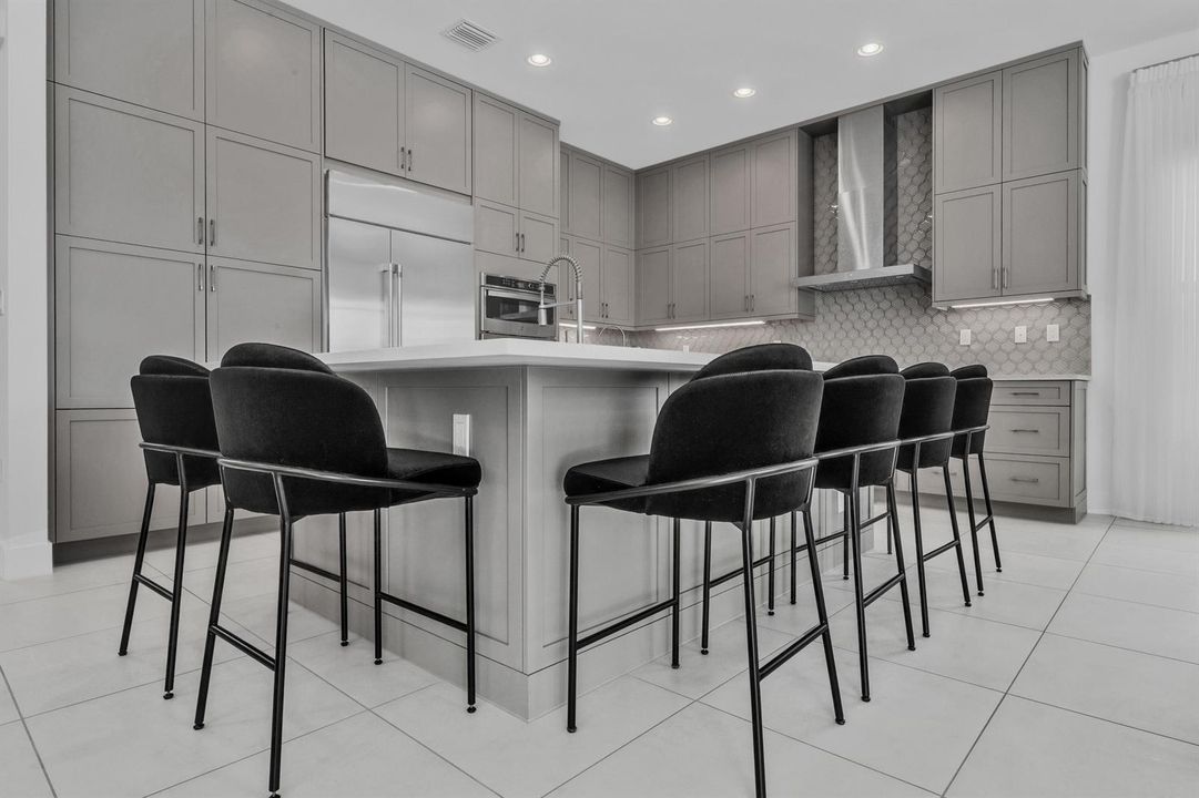 Kitchen — cabinetry to ceiling