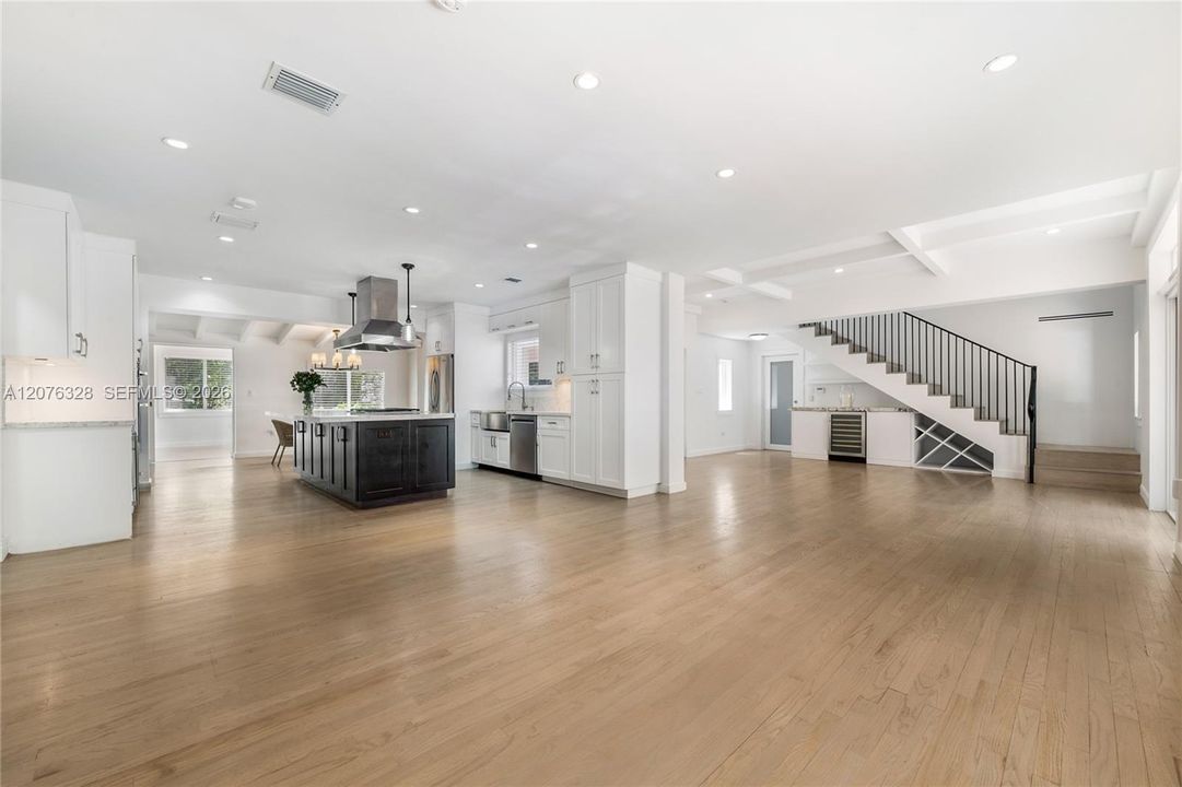 View from family room to Kitchen and Living room