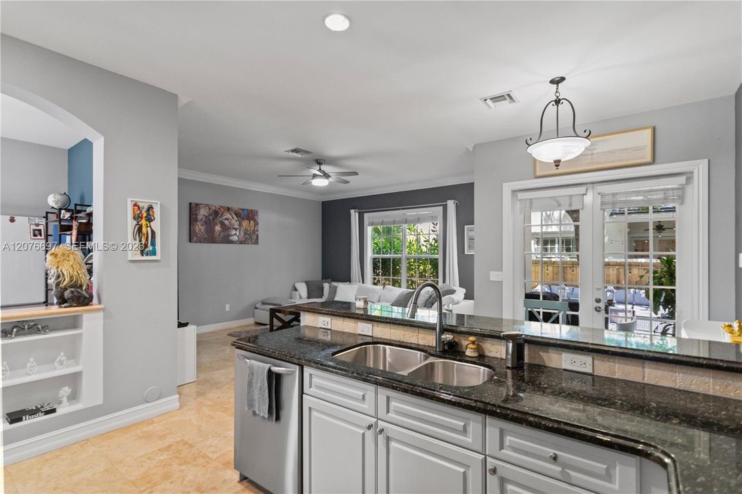 Open Kitchen to Great room with breakfast bar and dining area.