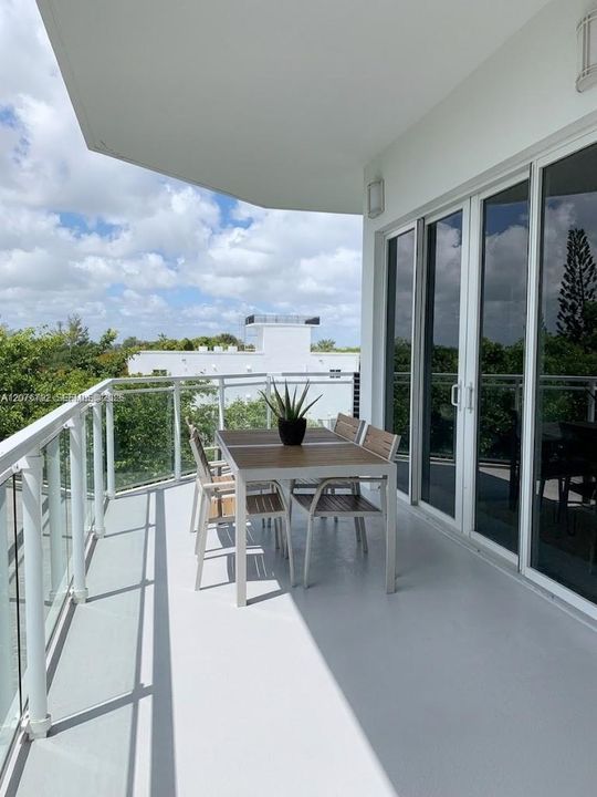huge 350 SF double wraparound balcony