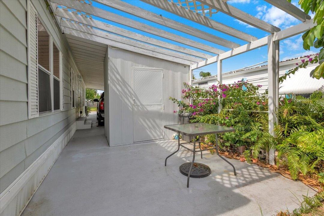 REAR PERGOLA COVERED PATIO/SITTING AREA