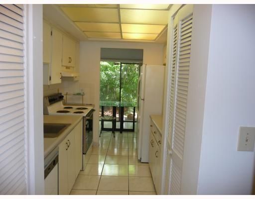 Kitchen has eat in area then the patio