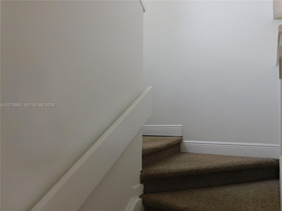 Stairs leading to 2nd floor.