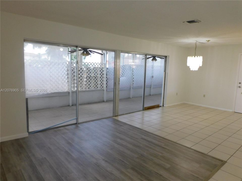 Large Sliders open to Covered Terrace enhancing entertaining space.
