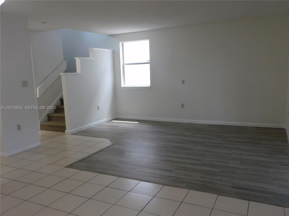 Downstairs tiled and Vinyl plank flooring for easy maintenance.