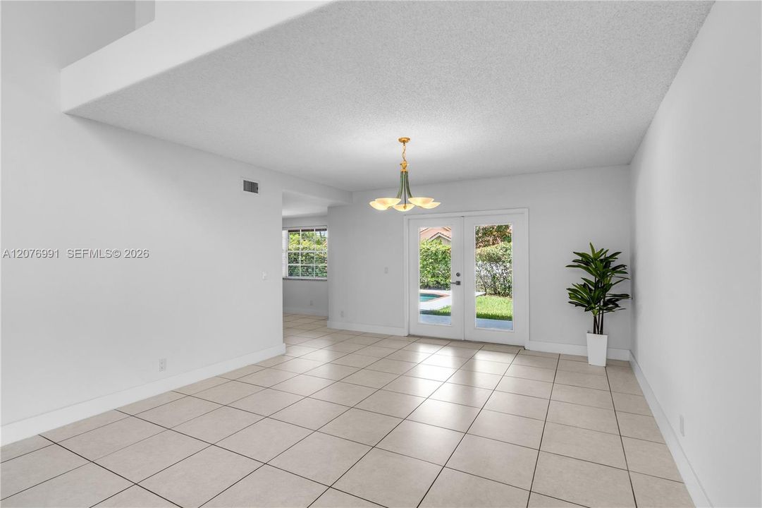 Living - Dining Room French doors lead to outside terrace