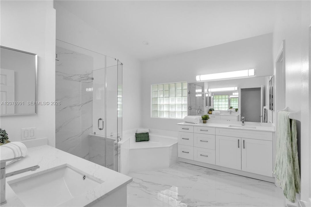 Recently upgraded with dual sink/vanities and private water closet