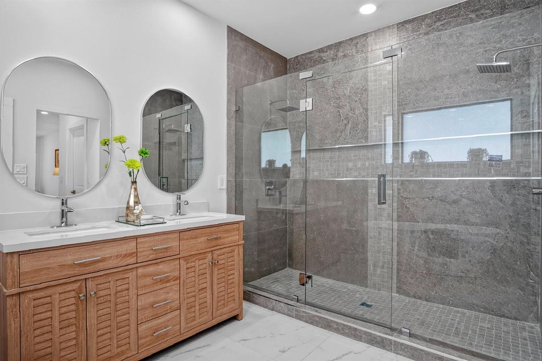 En suite bathrooms with double shower