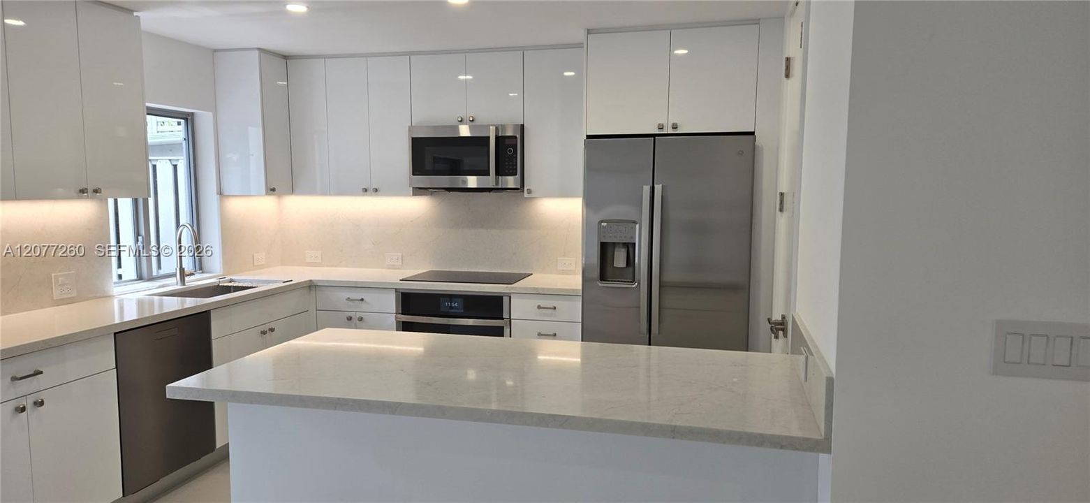 Completely renovated kitchen and all new appliances. Pantry area in kithen.