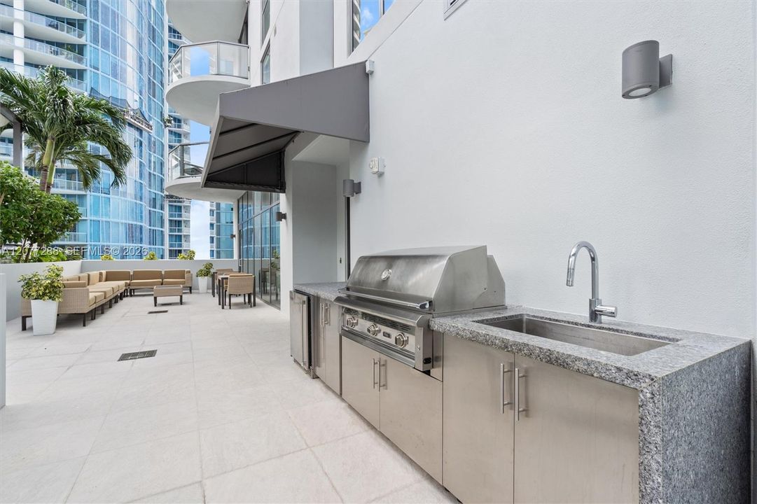 Patio - summer kitchen- building pool area