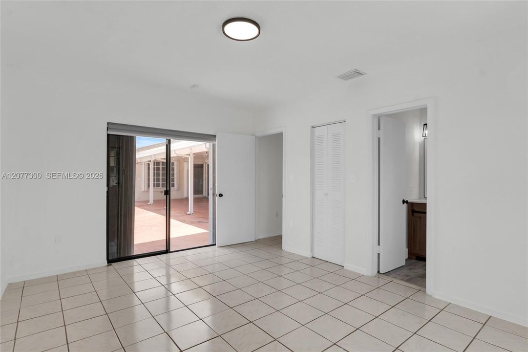 Main bedroom  in-law quarters. Has walk in closet and bathroom