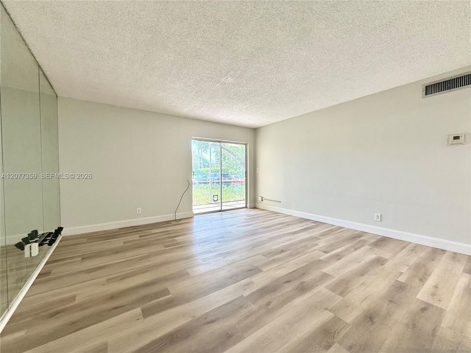 Living and dining area new floor fresh paint