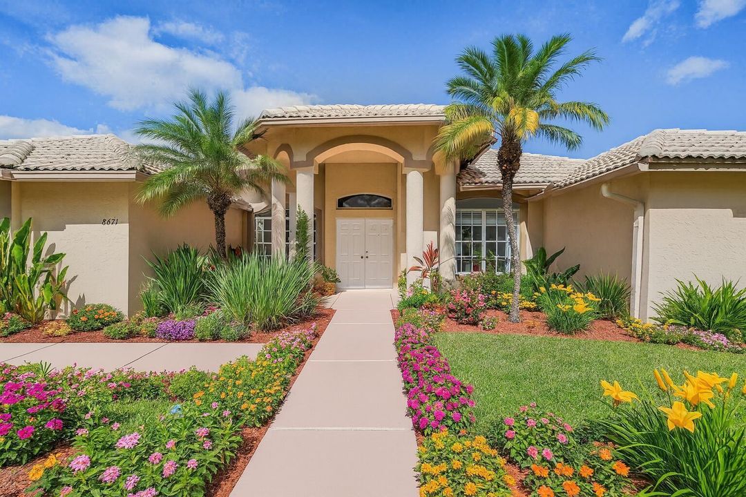 Mediterranean Home with Vibrant Landscap