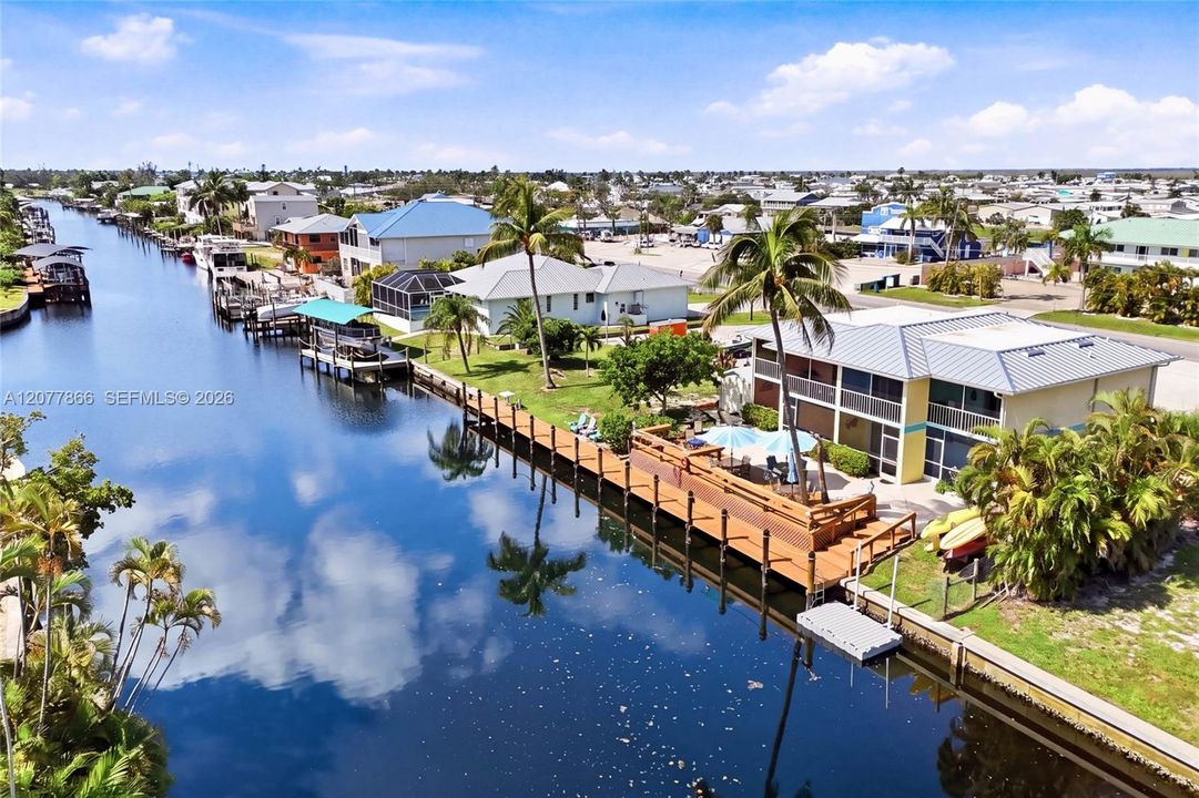 An impressive full-length waterfront dock provides exceptional boating access and plenty of space to enjoy everything Southwest Florida waterfront living has to offer.