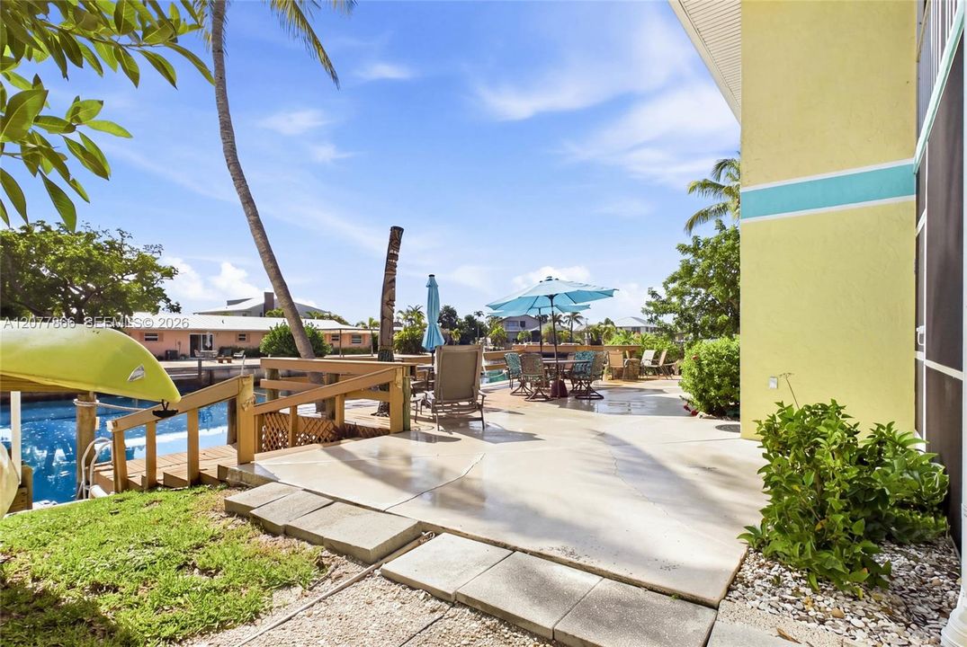 The oversized property provides generous outdoor areas where residents and vacation guests can relax and enjoy the casual Pine Island lifestyle.