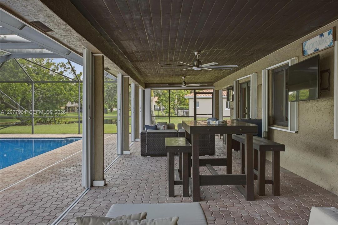 COVERED PATIO W/ HURRICANE PROTECTION