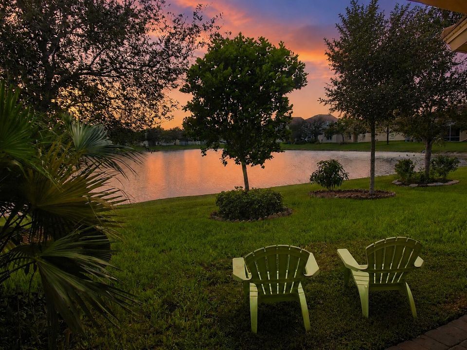 Twilight lakefront retreat with twin cha
