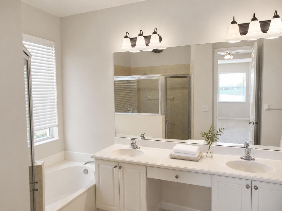 Bright neutral double-vanity bathroom