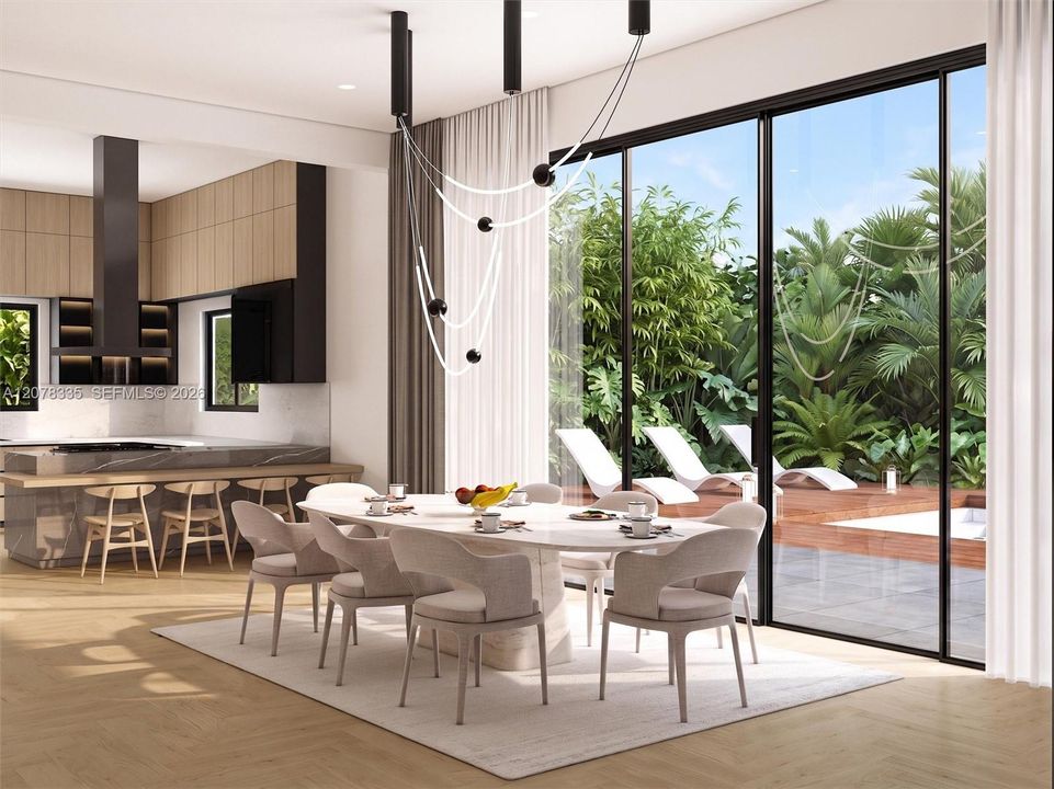 Open-concept dining space adjacent to the modern kitchen, perfect for entertaining guests.