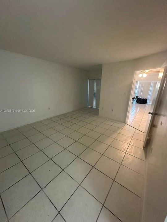 The master bedroom has access to a small patio