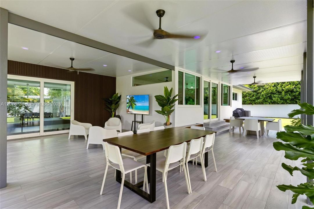 A covered terrace designed for long lunches, easy evenings, and everyday Florida living.