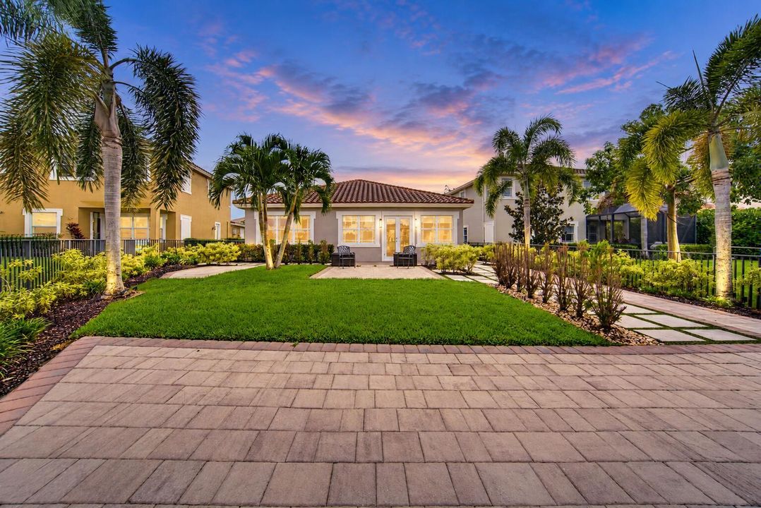Twilight Palm-Framed Backyard Retreat