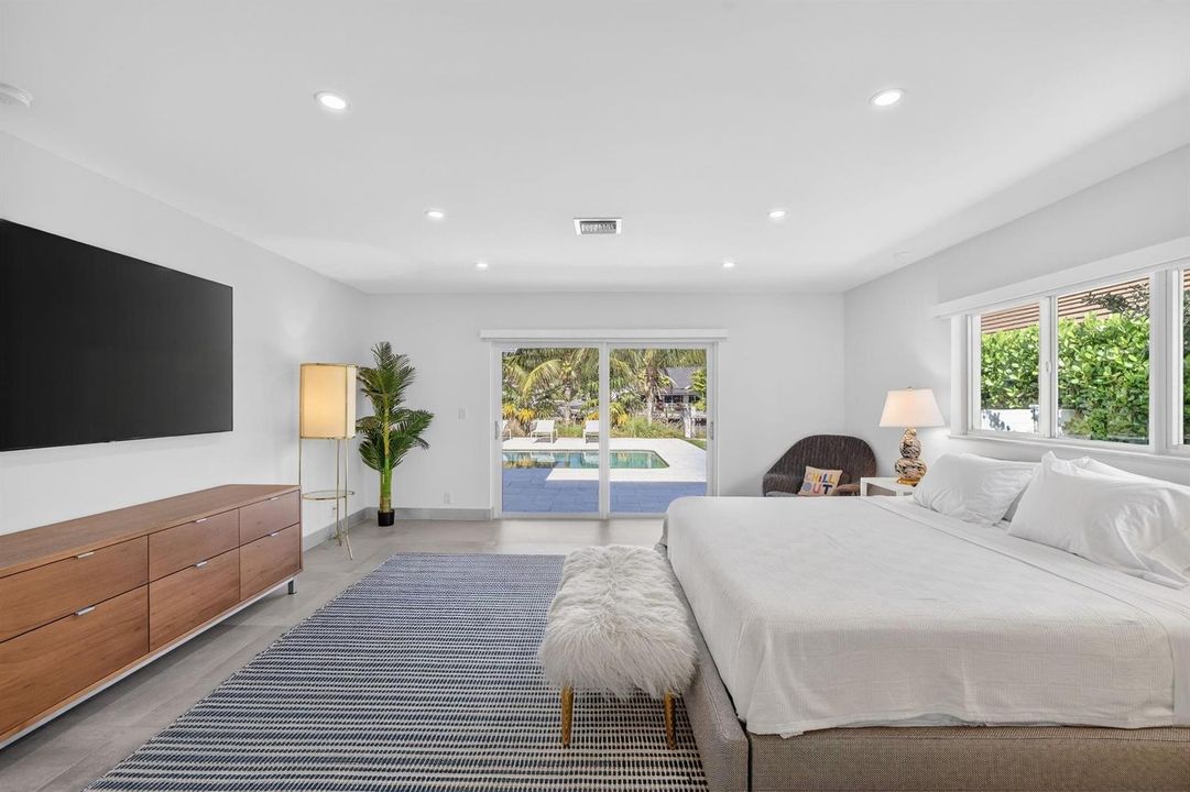 Private Primary Suite Opens to Pool Area