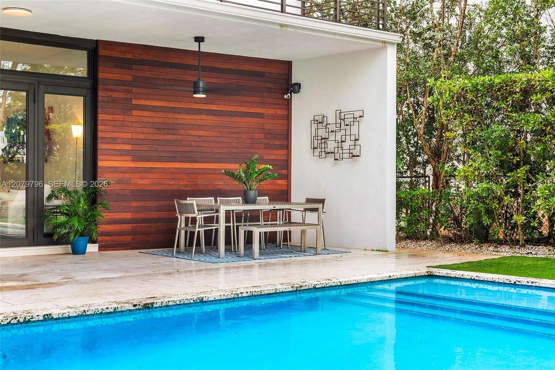 Pool, outdoor covered patio & dining area
