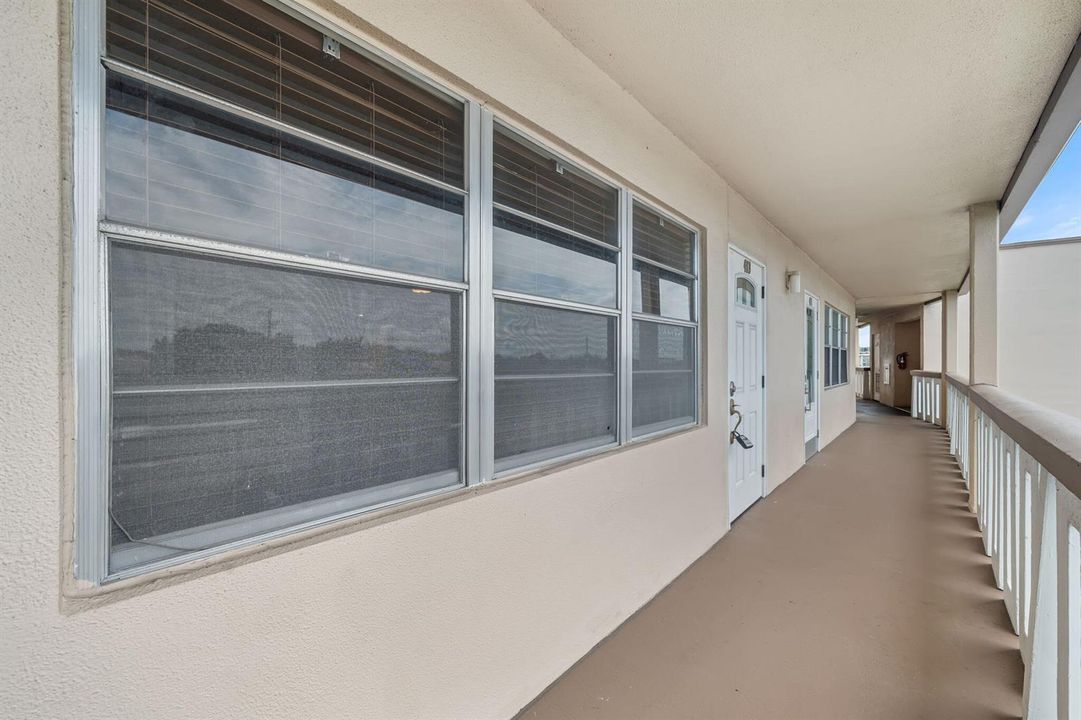 Open-air walkway to the front entrance
