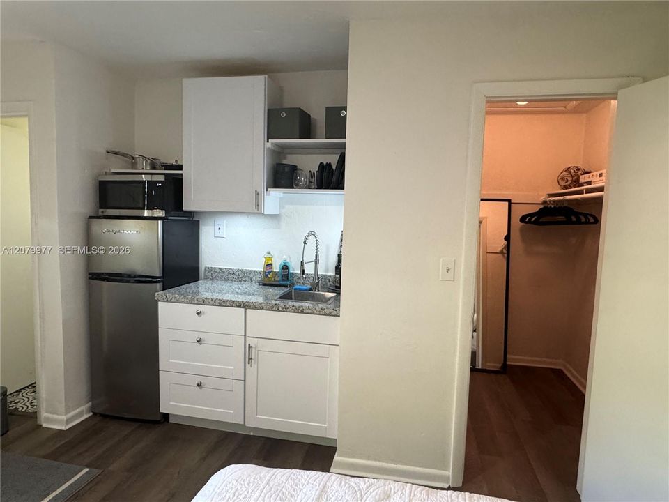 Left side door goes into the Full Bathroom with Shower and on the right side door is the walk in Closet