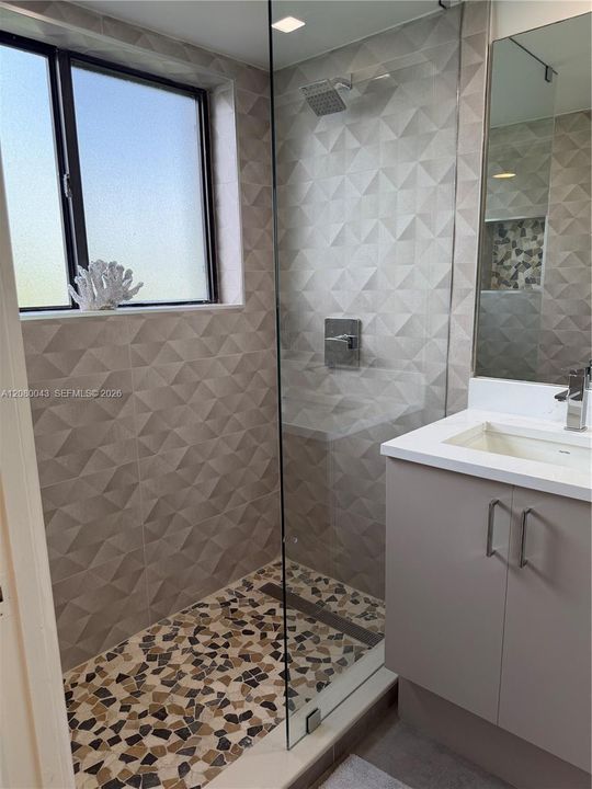Shower with cool geo tiles