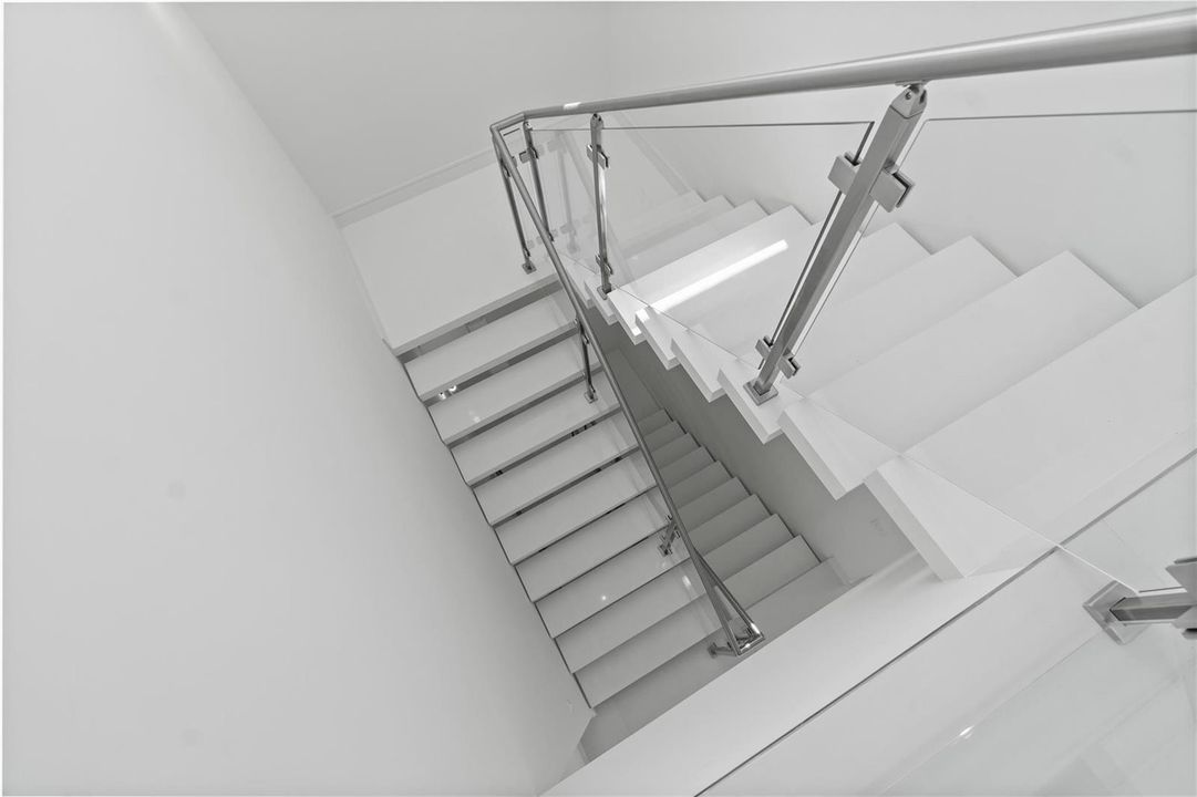 Staircase to rooftop lounge area