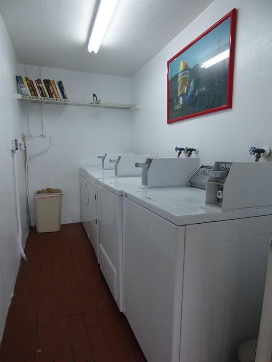 Laundry Downstairs Secure by Carport