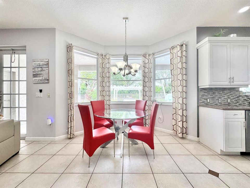 KITCHEN DINING AREA WITH BAY WINDOW